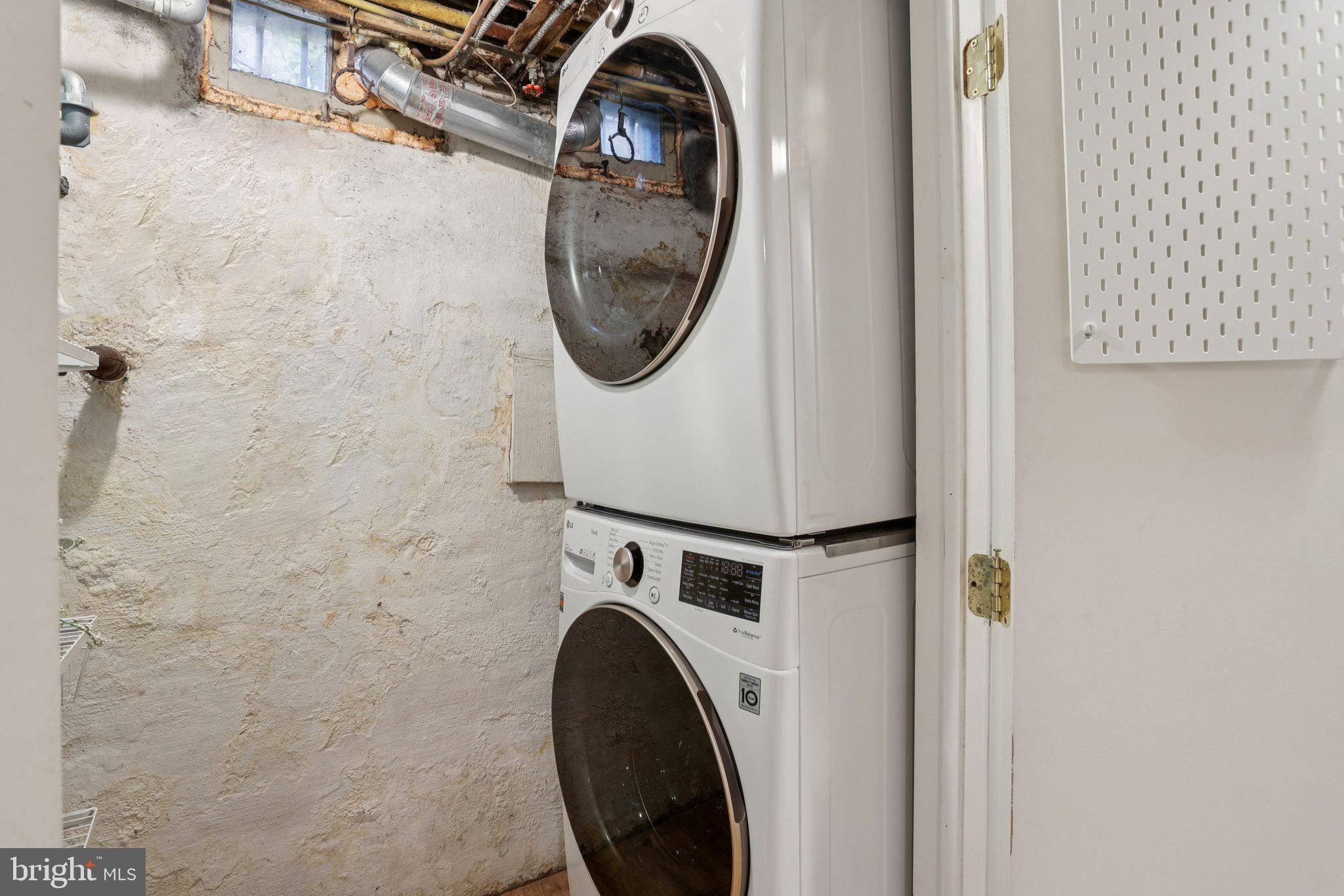 323 South Camac Street Philadelphia, PA 19107 - Photo 35 of 37 a utility room with dryer and washer