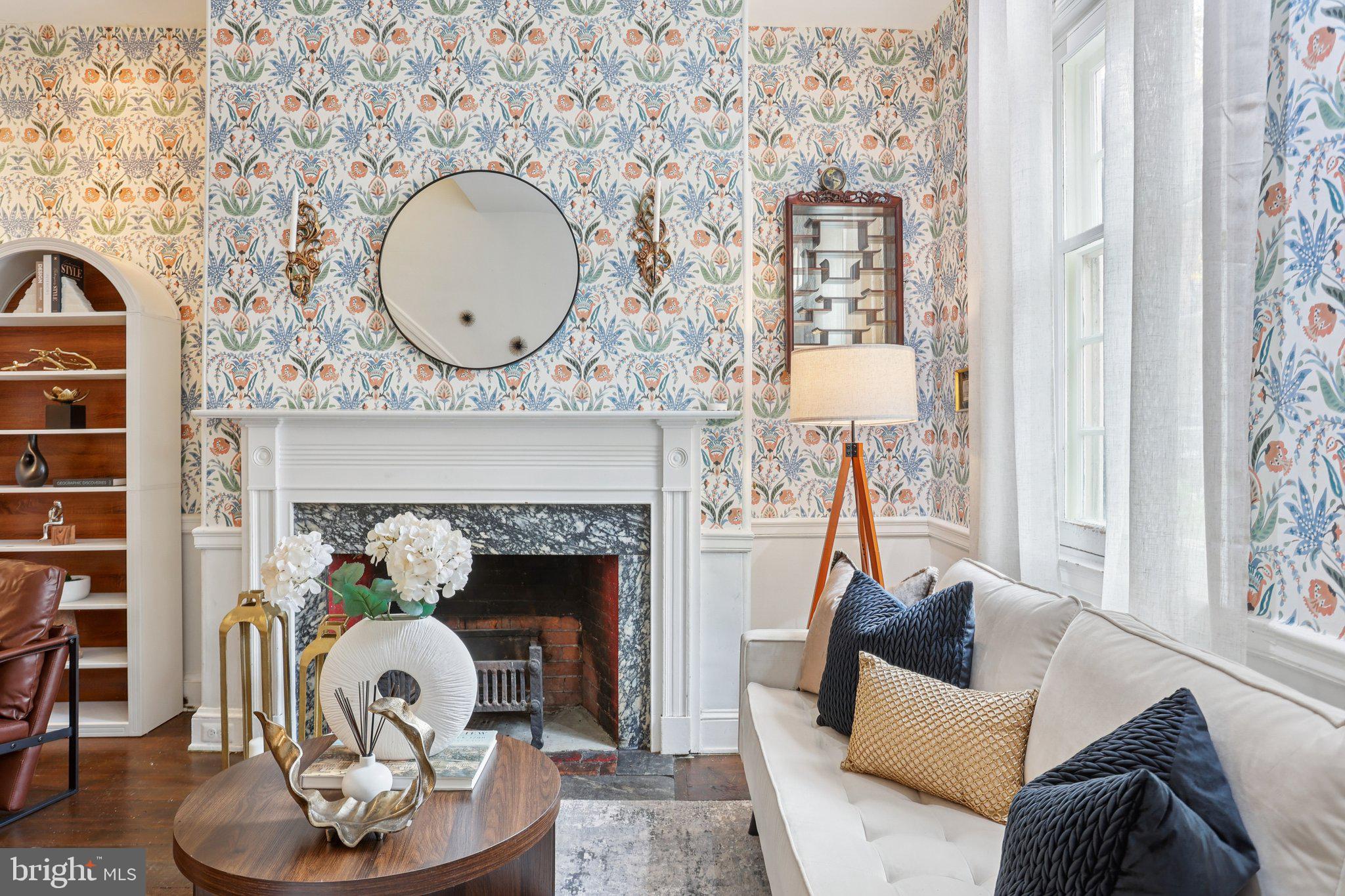 323 South Camac Street Philadelphia, PA 19107 - Photo 5 of 37 a living room with furniture and a fireplace