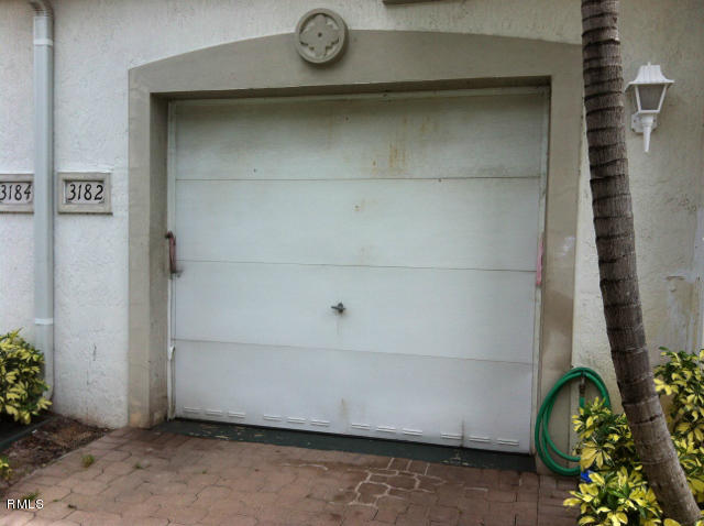 3182 Laurel Ridge Circle Riviera Beach, FL 33404 - Photo 17 of 23 a view of door