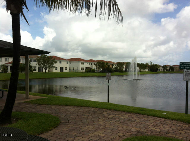 3182 Laurel Ridge Circle Riviera Beach, FL 33404 - Photo 18 of 23 a view of a lake