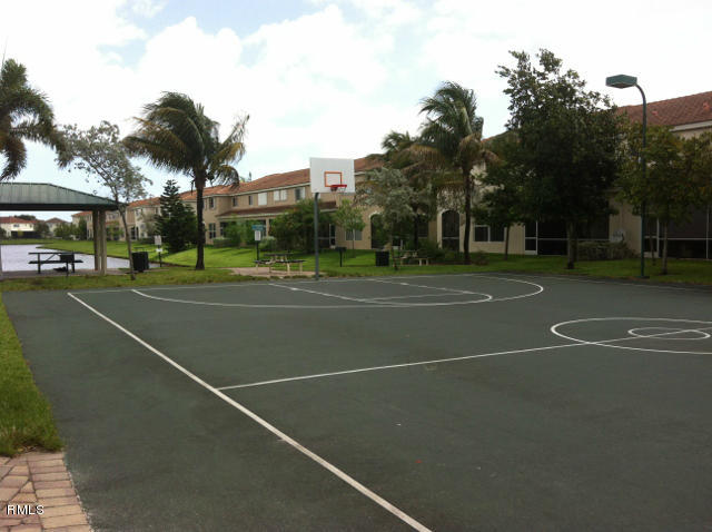 3182 Laurel Ridge Circle Riviera Beach, FL 33404 - Photo 22 of 23 a view of a tennis court