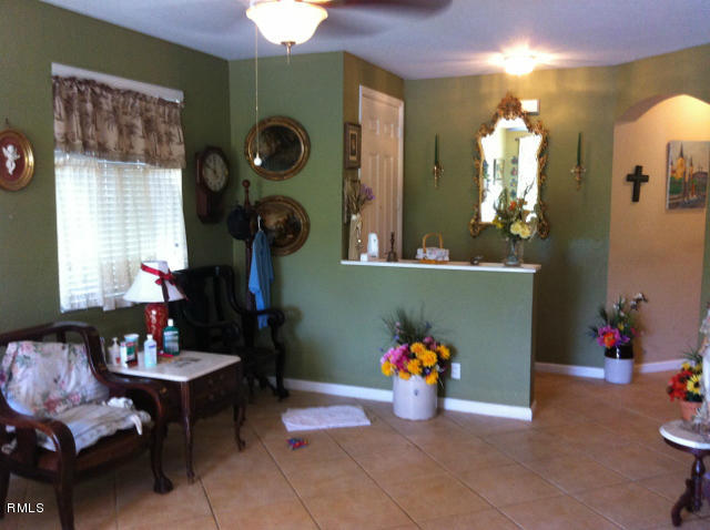 3182 Laurel Ridge Circle Riviera Beach, FL 33404 - Photo 6 of 23 a living room with furniture and decor