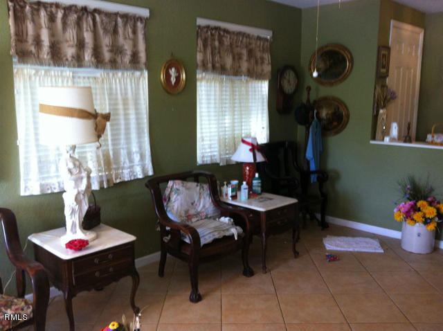 3182 Laurel Ridge Circle Riviera Beach, FL 33404 - Photo 7 of 23 a living room with furniture and decor