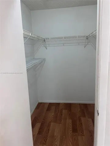 a view of a room with racks on the wall