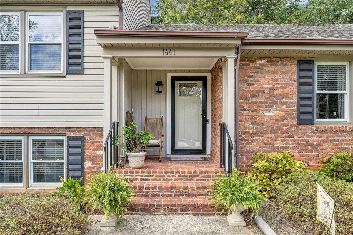 1441 Trents Ferry Road Lynchburg, VA 24503 - Photo 15 of 67 a front view of a house with potted plants