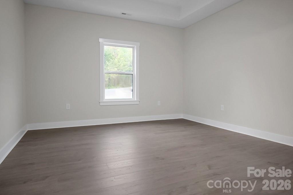 129 Rosecommon Lane Rutherfordton, NC 28139 - Photo 15 of 31 an empty room with a window
