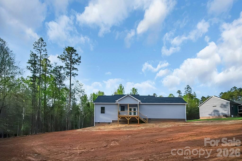 129 Rosecommon Lane Rutherfordton, NC 28139 - Photo 27 of 31 a view of a house with a backyard
