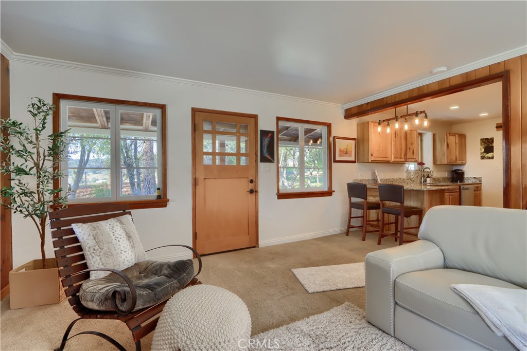 5641 Darrah Road Mariposa, CA 95338 - Photo 13 of 58 a living room with furniture and large windows
