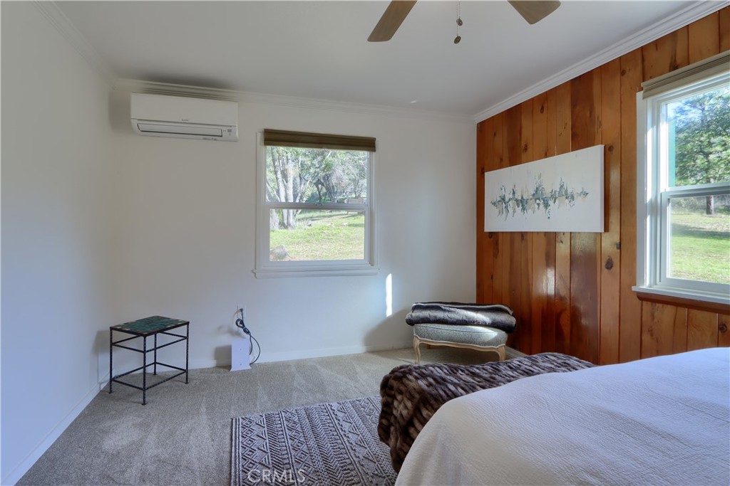 5641 Darrah Road Mariposa, CA 95338 - Photo 26 of 58 a bedroom with a bed and a window