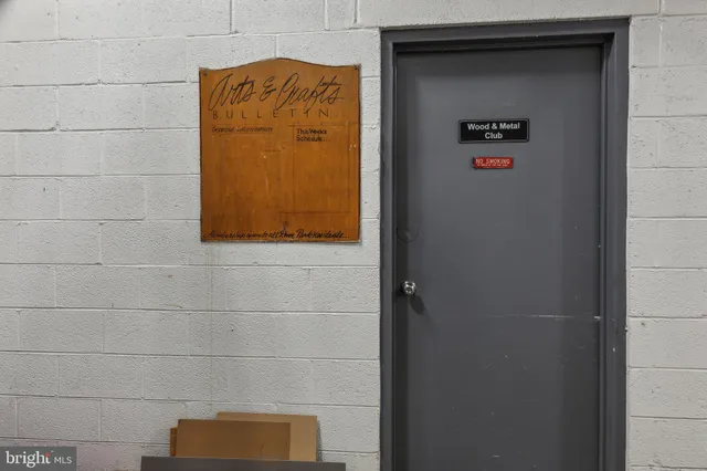 a bathroom with a shower and a sink