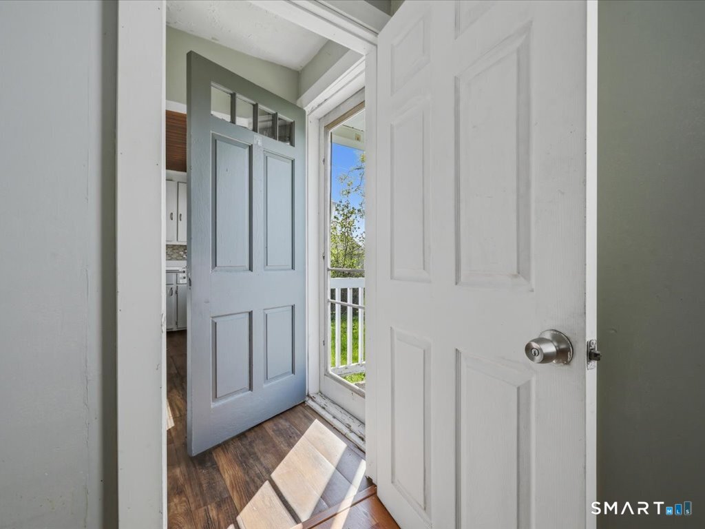 16 Grandview Terrace Portland, CT 06480 - Photo 11 of 37 a view of an entryway with wooden floor