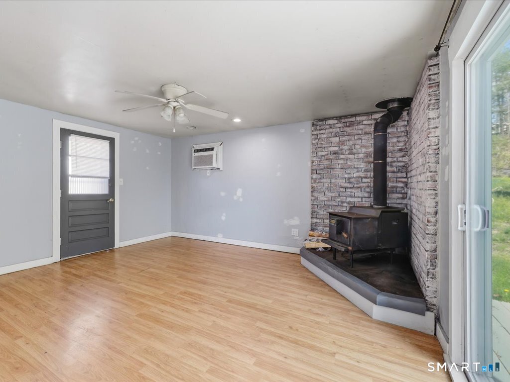16 Grandview Terrace Portland, CT 06480 - Photo 13 of 37 wooden floor in an empty room with a window