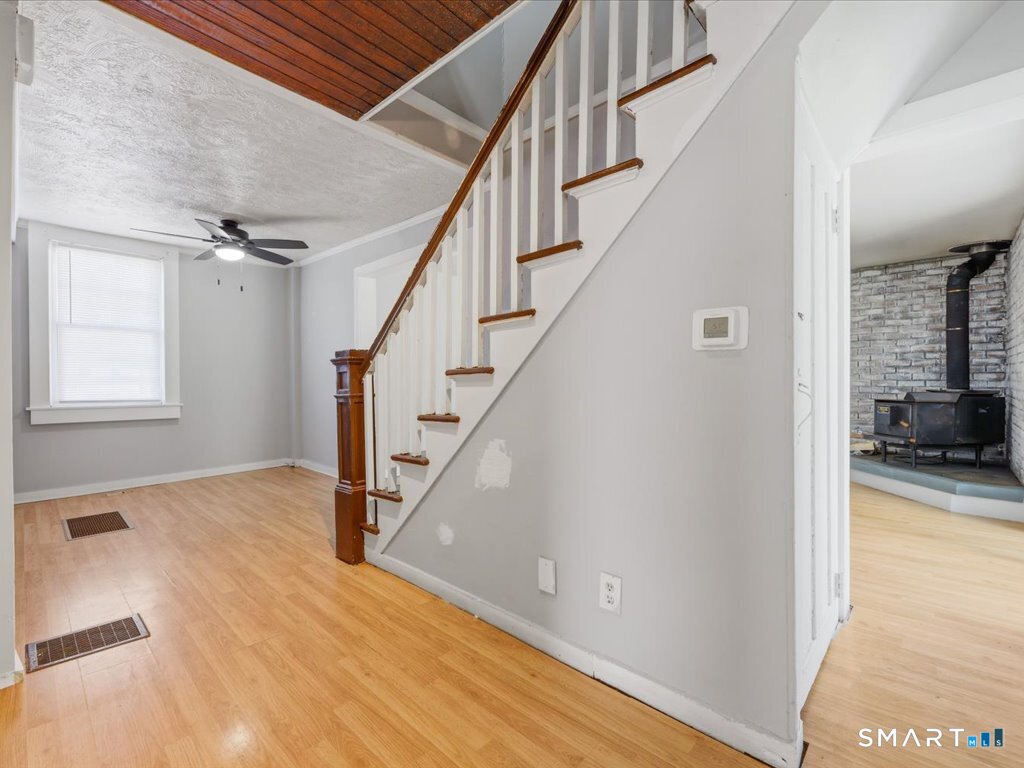 16 Grandview Terrace Portland, CT 06480 - Photo 18 of 37 a view of entryway and hall with wooden floor