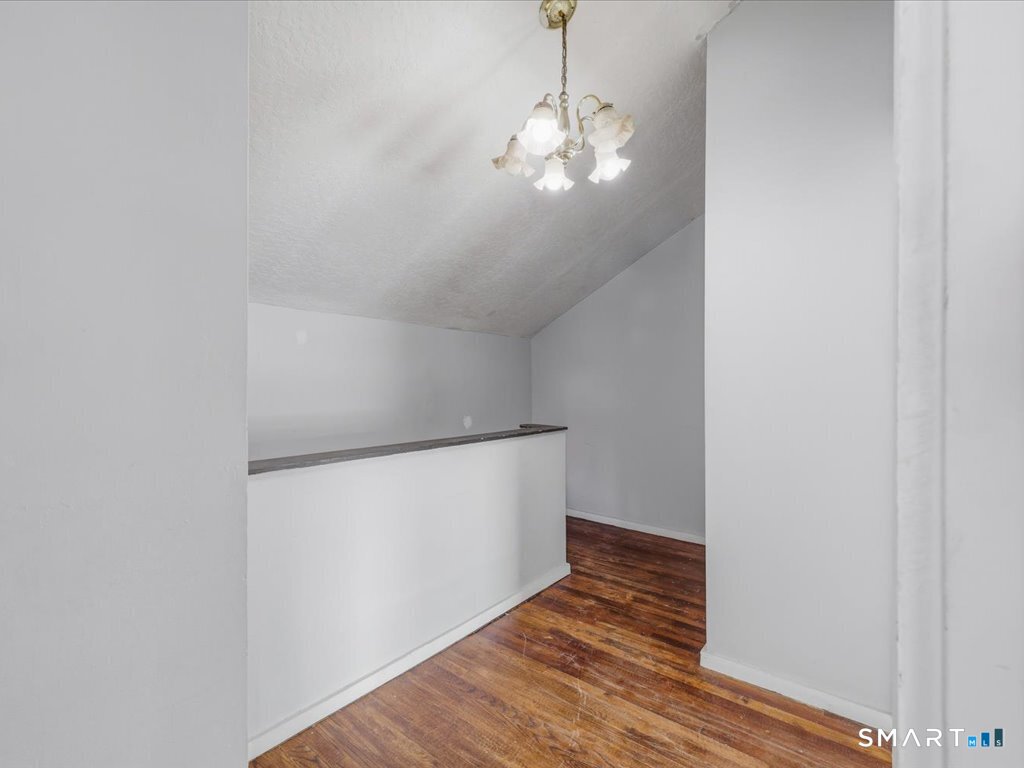 16 Grandview Terrace Portland, CT 06480 - Photo 30 of 37 a view of empty room with wooden floor