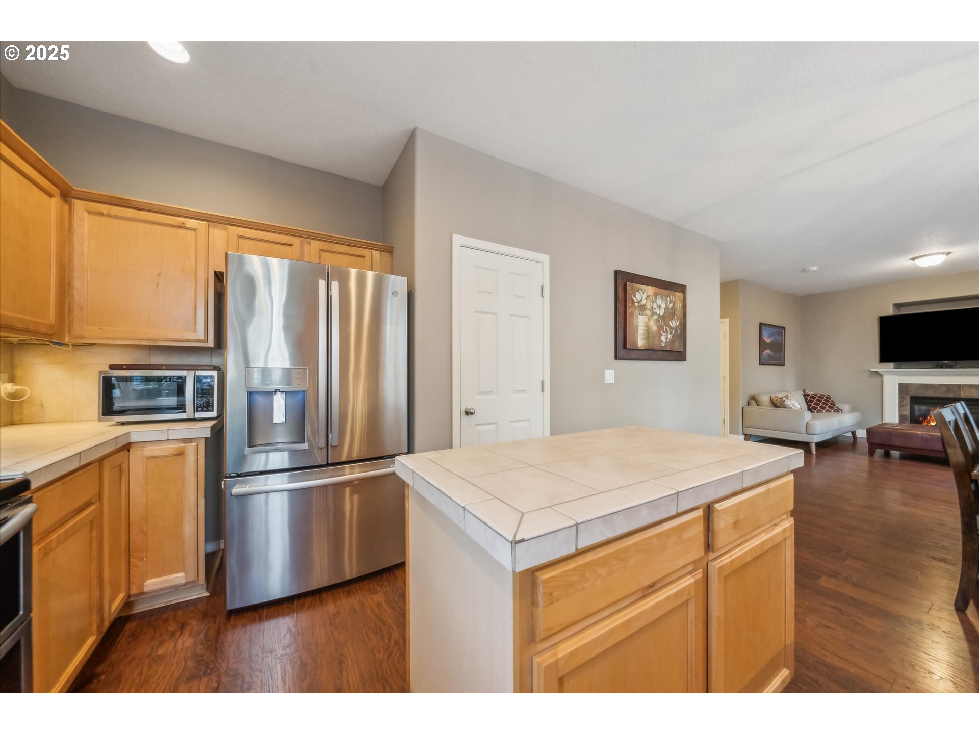 39697 Evans Street Sandy, OR 97055 - Photo 14 of 39 a kitchen with a refrigerator and a stove top oven