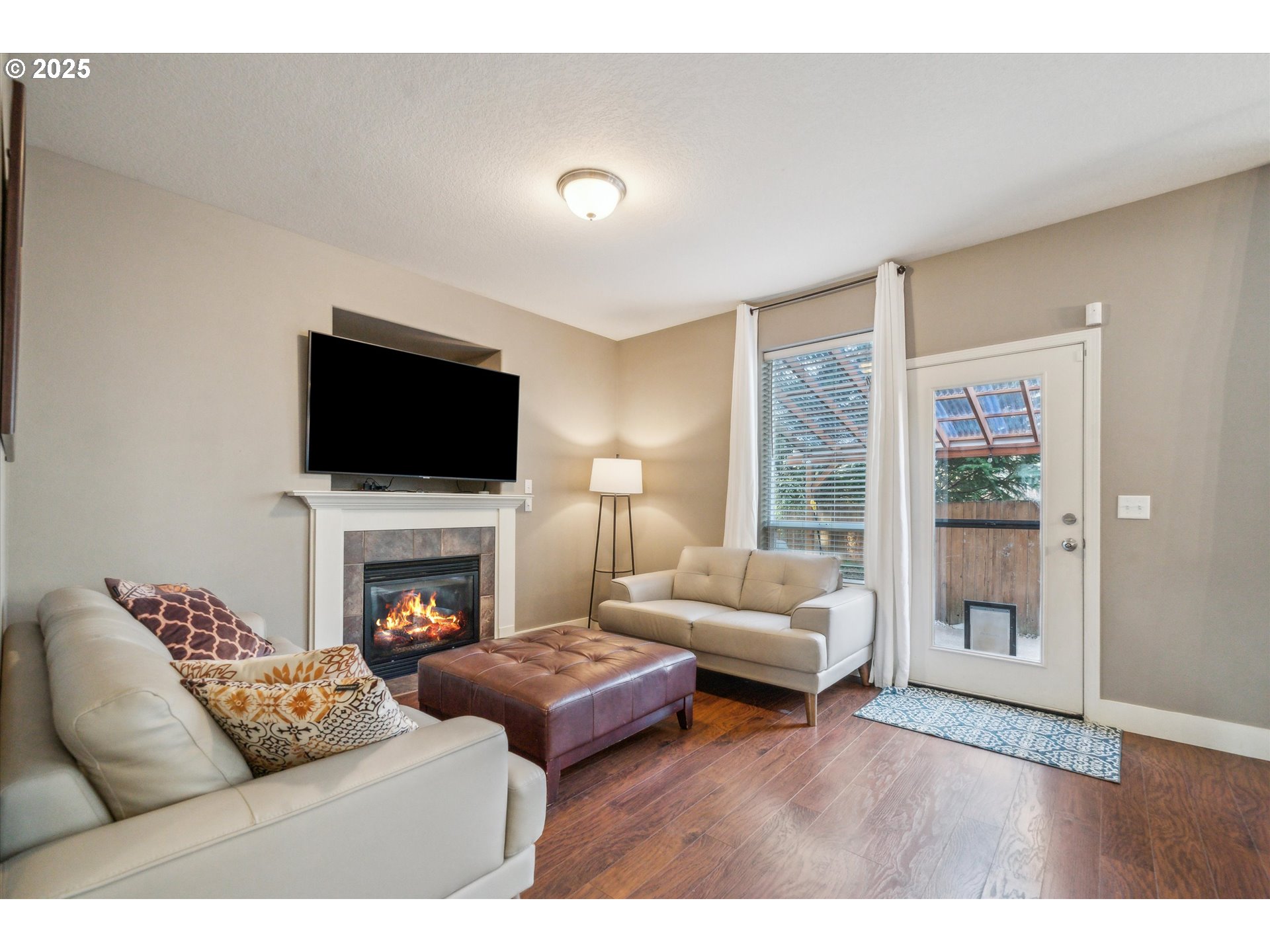 39697 Evans Street Sandy, OR 97055 - Photo 5 of 39 a living room with furniture and a fireplace