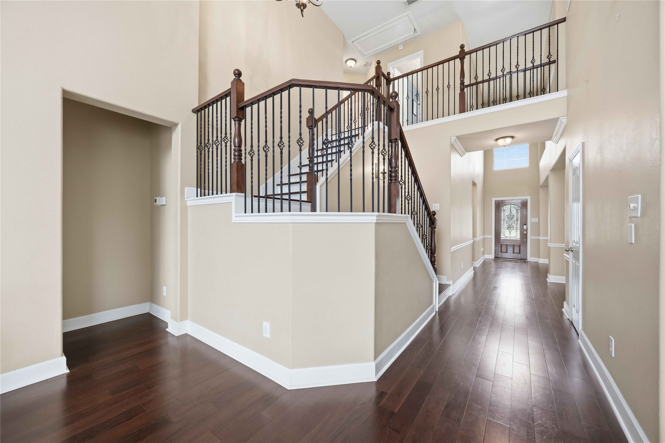 803 Northridge Terrace Lane Spring, TX 77373 - Photo 18 of 42 a view of staircase with railing and white walls