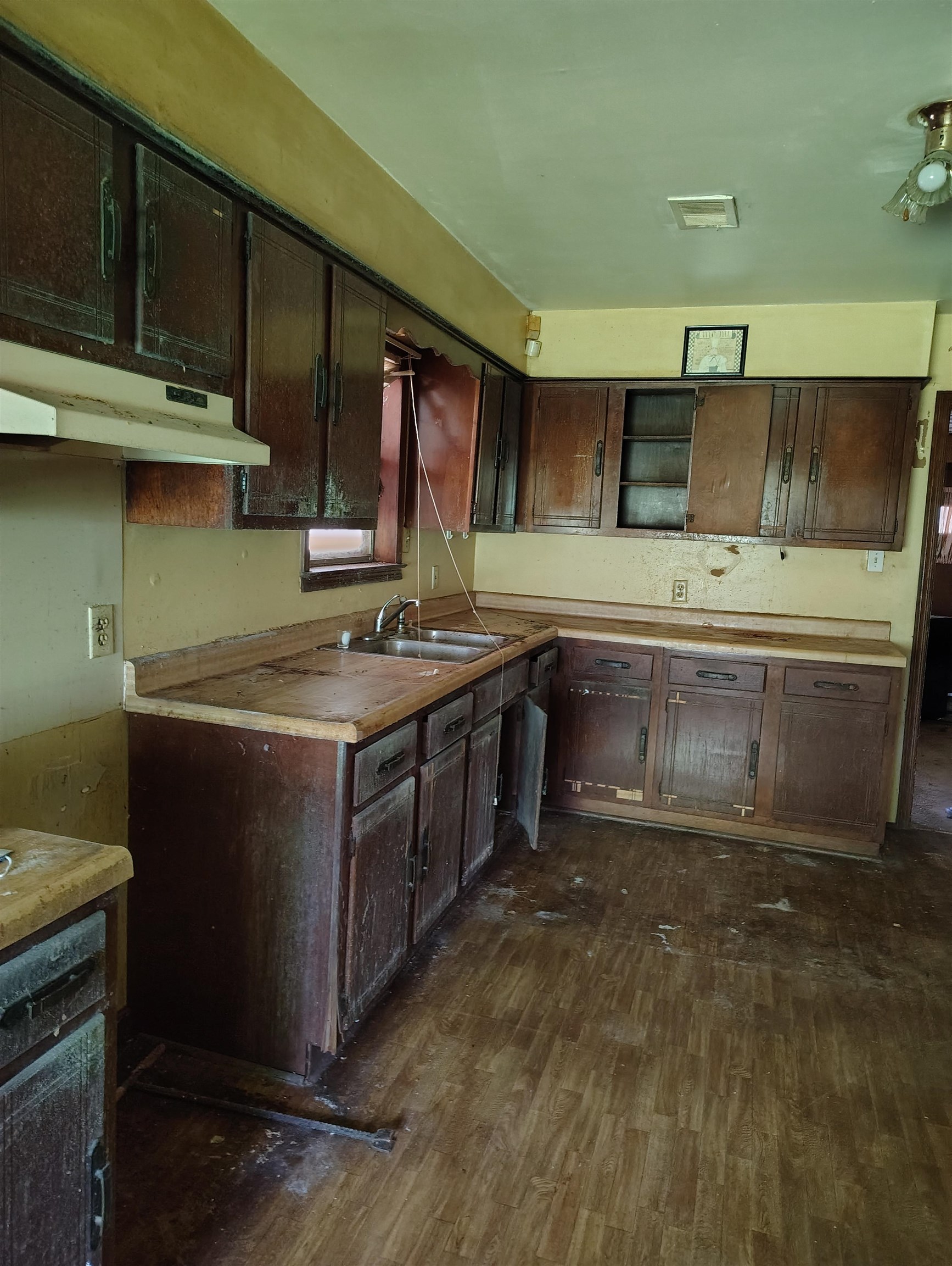 1663 Pisgah Road Cordova, TN 38016 - Photo 3 of 3 a kitchen with stainless steel appliances granite countertop a sink a stove and a microwave