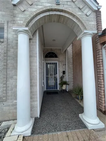 a front view of a house with a porch