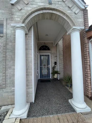 a front view of a house with a porch