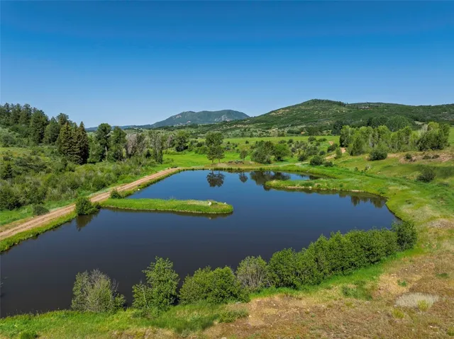 a view of a house with a lake view