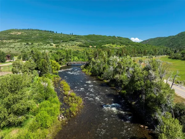 a view of a yard with an outdoor space