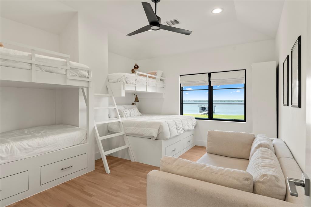 111 Sun Valley Mabank, TX 75147 - Photo 23 of 40 Second bunk room with built-in bunks and lake view.