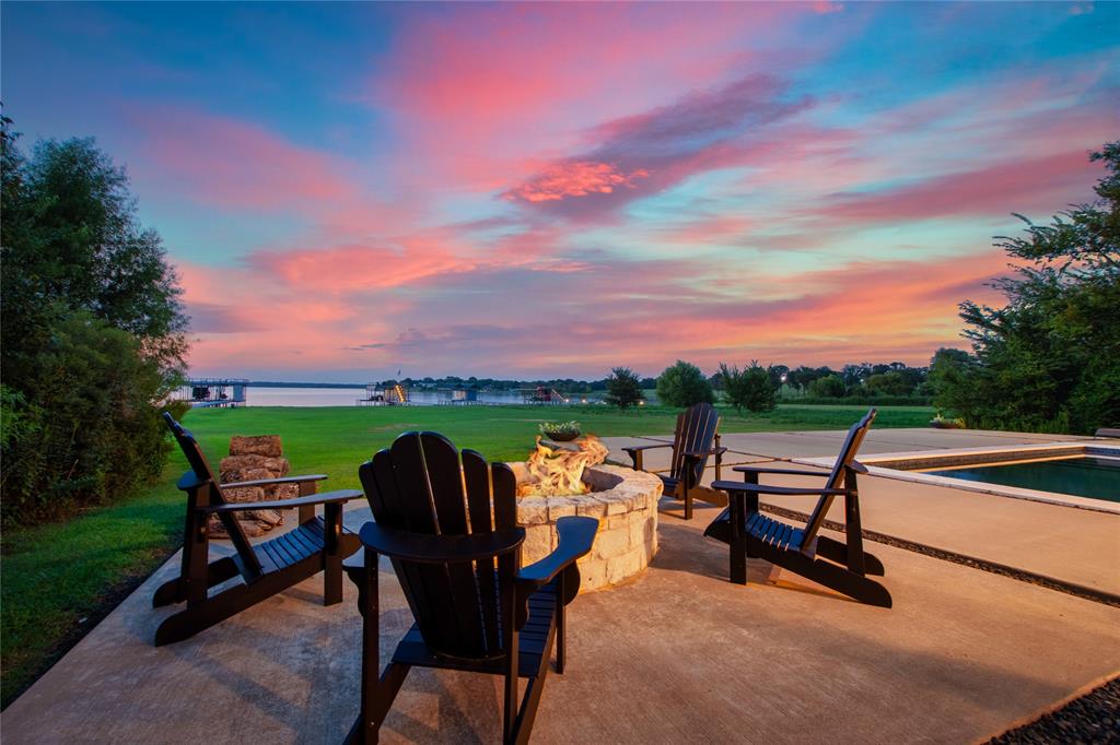 111 Sun Valley Mabank, TX 75147 - Photo 4 of 40 6. Outdoor stone firepit perfect for evening gatherings.