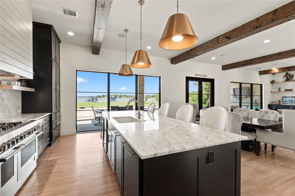 111 Sun Valley Mabank, TX 75147 - Photo 9 of 40 Island with wine fridge and ice maker