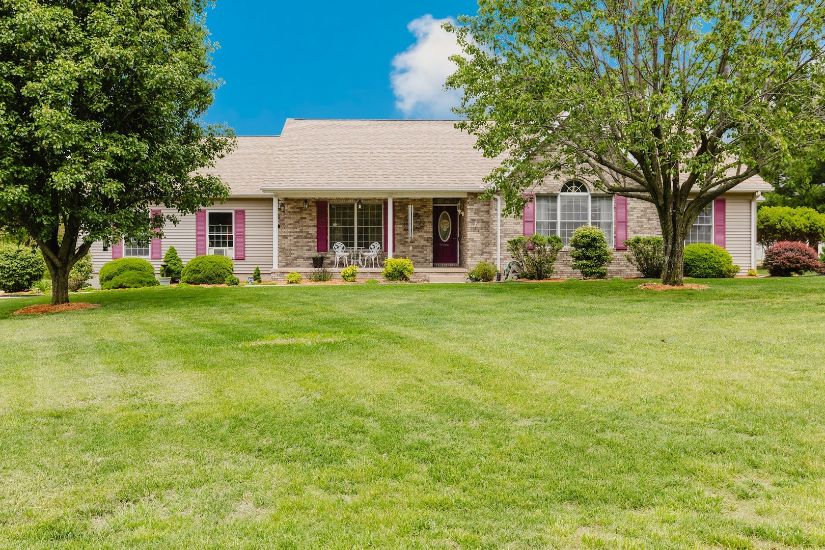 15136 Eastland Road Marion, IL 62959 - Photo 1 of 49 a front view of a building with a garden
