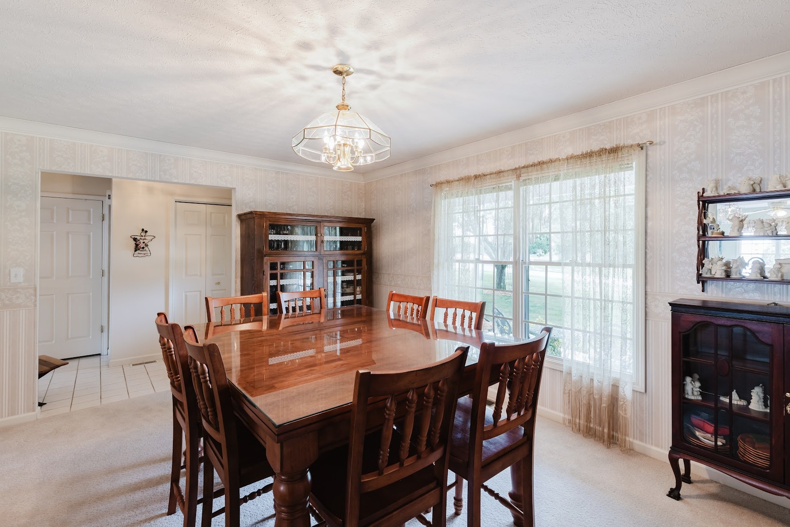 15136 Eastland Road Marion, IL 62959 - Photo 16 of 49 a view of a dining room with furniture window and wooden floor