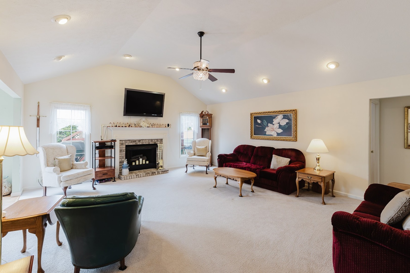 15136 Eastland Road Marion, IL 62959 - Photo 17 of 49 a living room with furniture fireplace and a flat screen tv