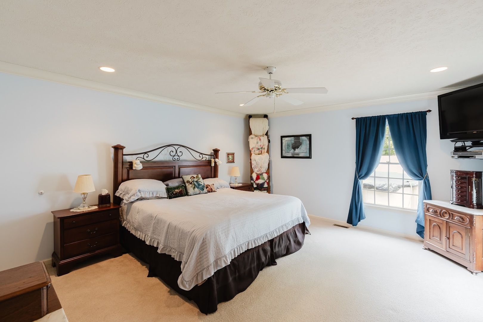 15136 Eastland Road Marion, IL 62959 - Photo 21 of 49 a bedroom with a bed and a flat screen tv