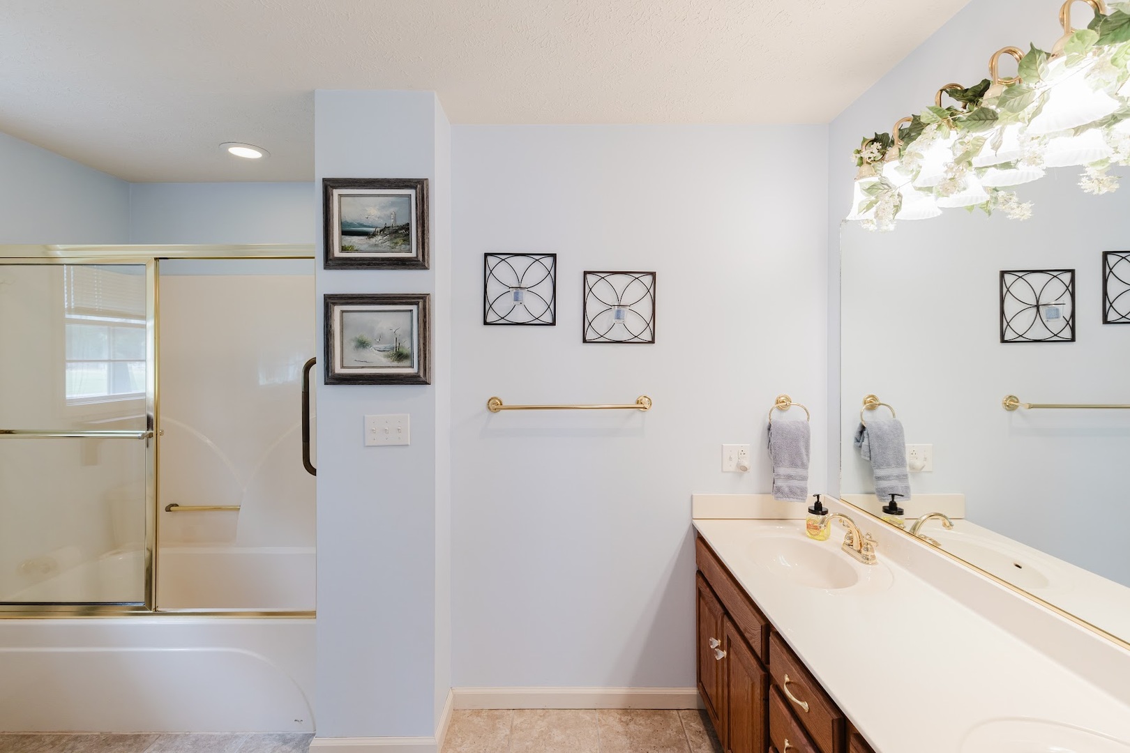 15136 Eastland Road Marion, IL 62959 - Photo 23 of 49 a bathroom with a sink a mirror and a shower
