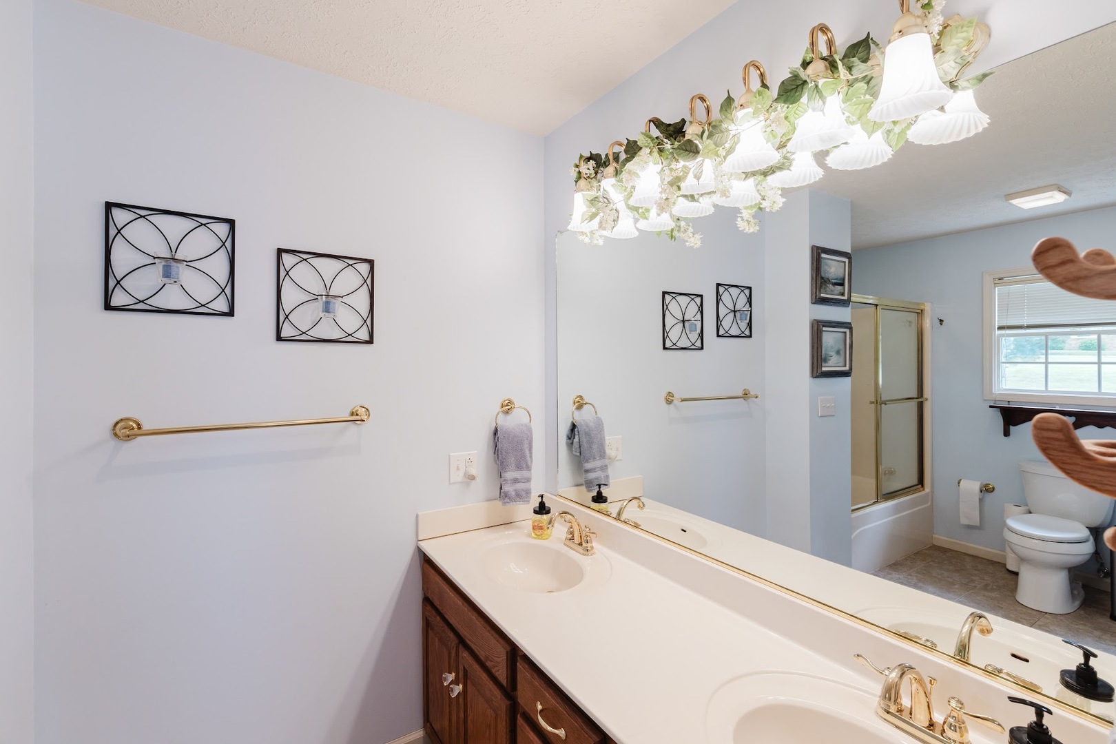 15136 Eastland Road Marion, IL 62959 - Photo 24 of 49 a bathroom with a sink mirror and vanity