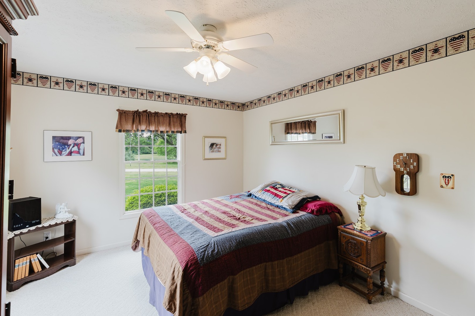 15136 Eastland Road Marion, IL 62959 - Photo 28 of 49 a bedroom with a bed and a chandelier