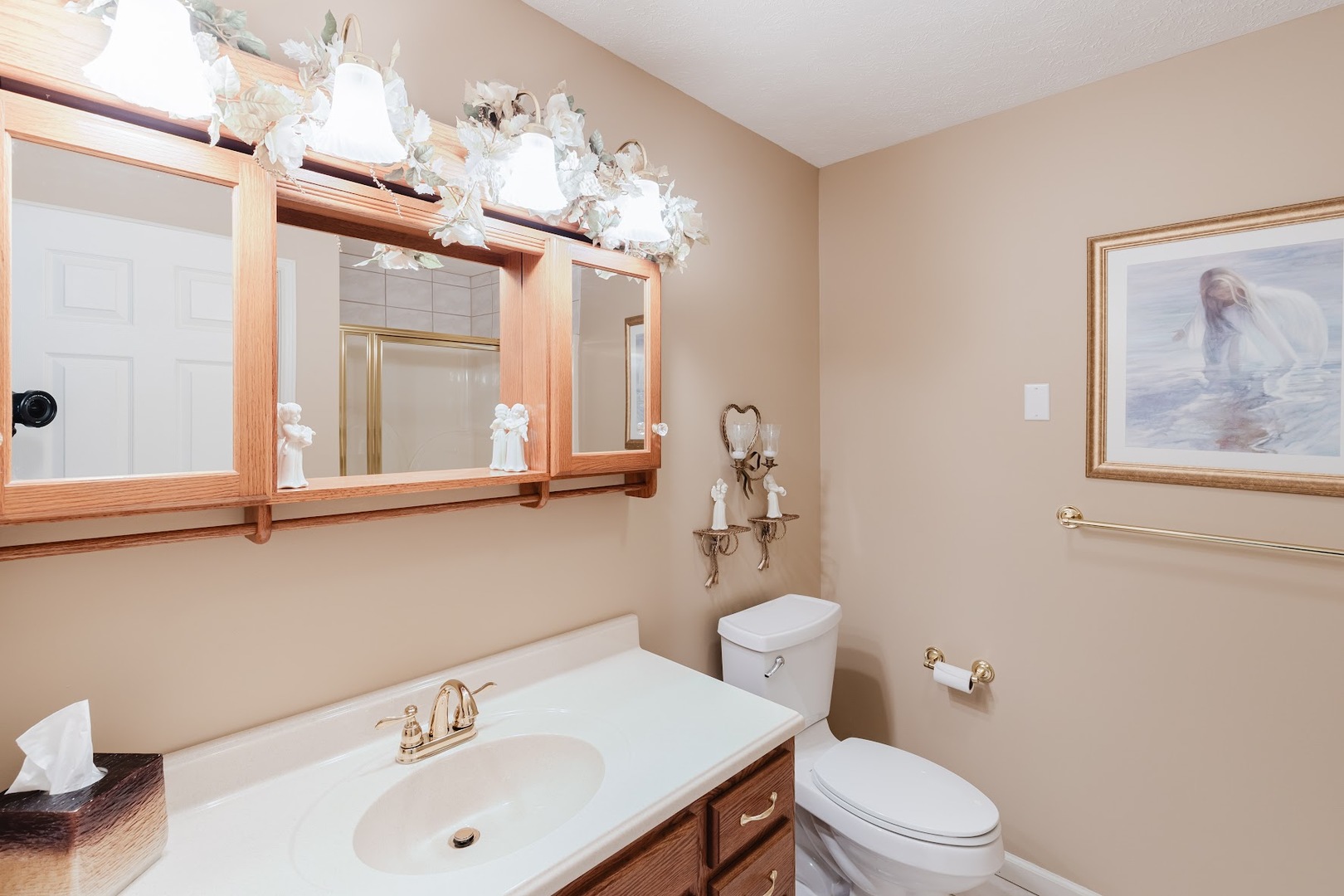 15136 Eastland Road Marion, IL 62959 - Photo 38 of 49 a bathroom with a sink mirror and toilet