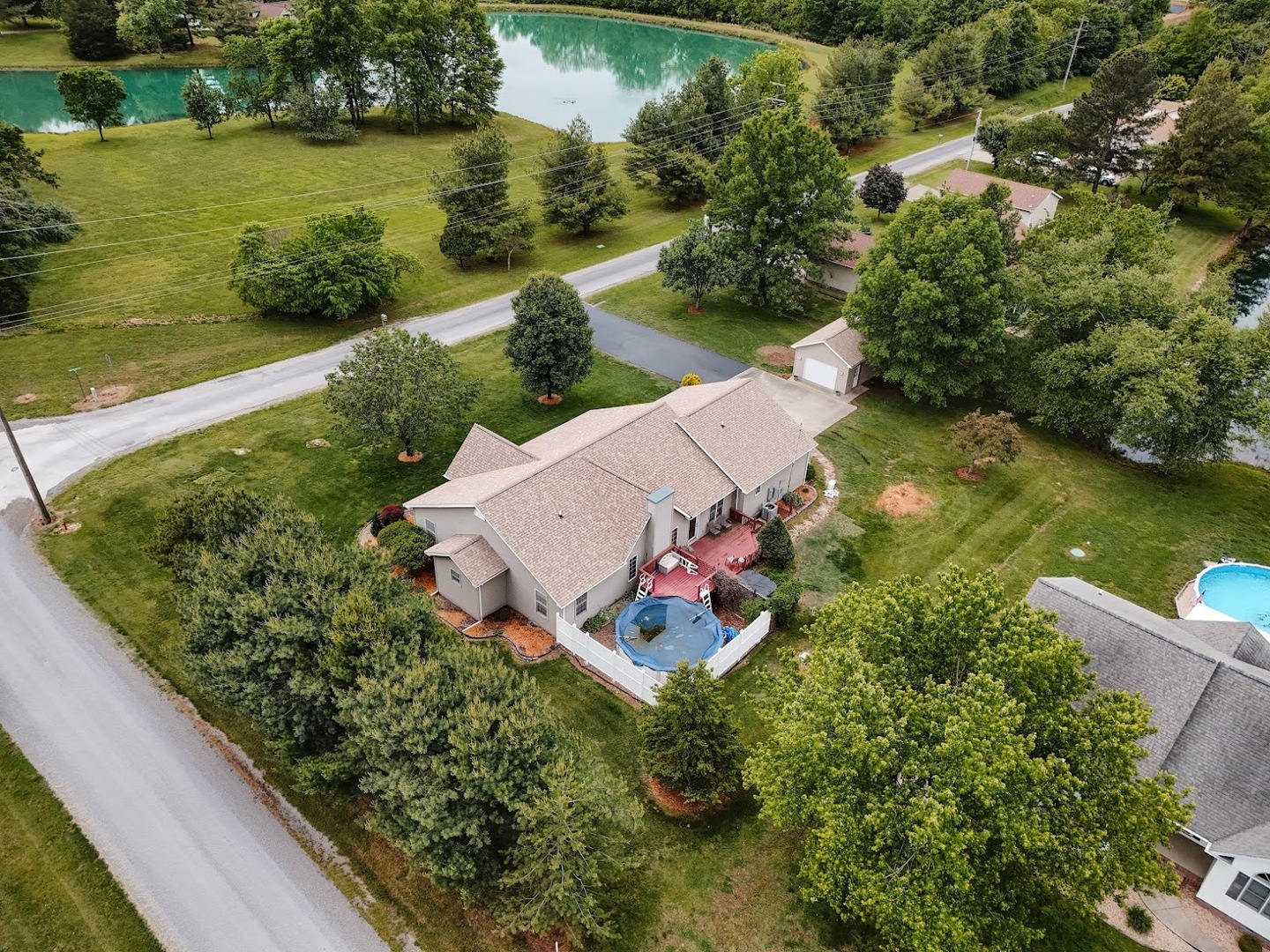 15136 Eastland Road Marion, IL 62959 - Photo 45 of 49 an aerial view of a house with a garden and lake view