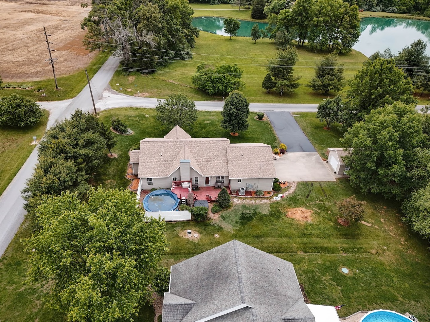 15136 Eastland Road Marion, IL 62959 - Photo 47 of 49 an aerial view of a house with a yard and lake view