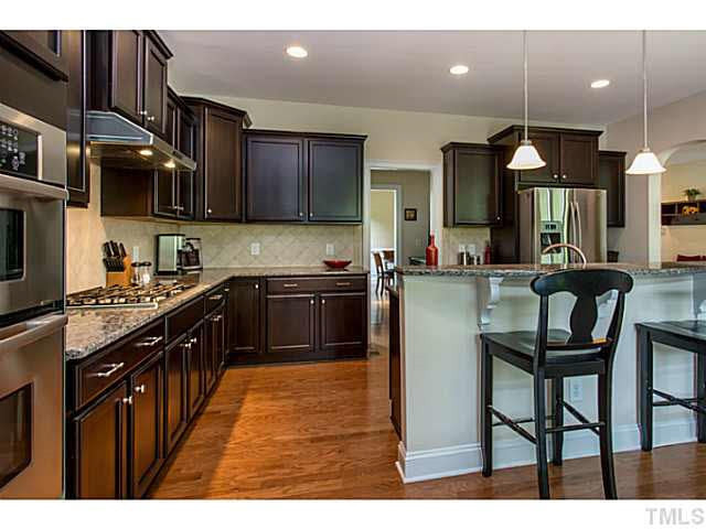Another view of the beautiful kitchen. Lots of COUNTER SPACE and TONS of CABINETS to store all of your culinary items. Kitchen