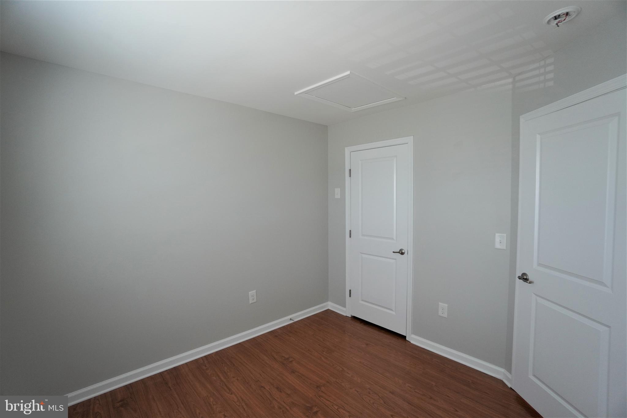 900 Susan Circle North Wales, PA 19454 - Photo 19 of 30 a view of an empty room with wooden floor