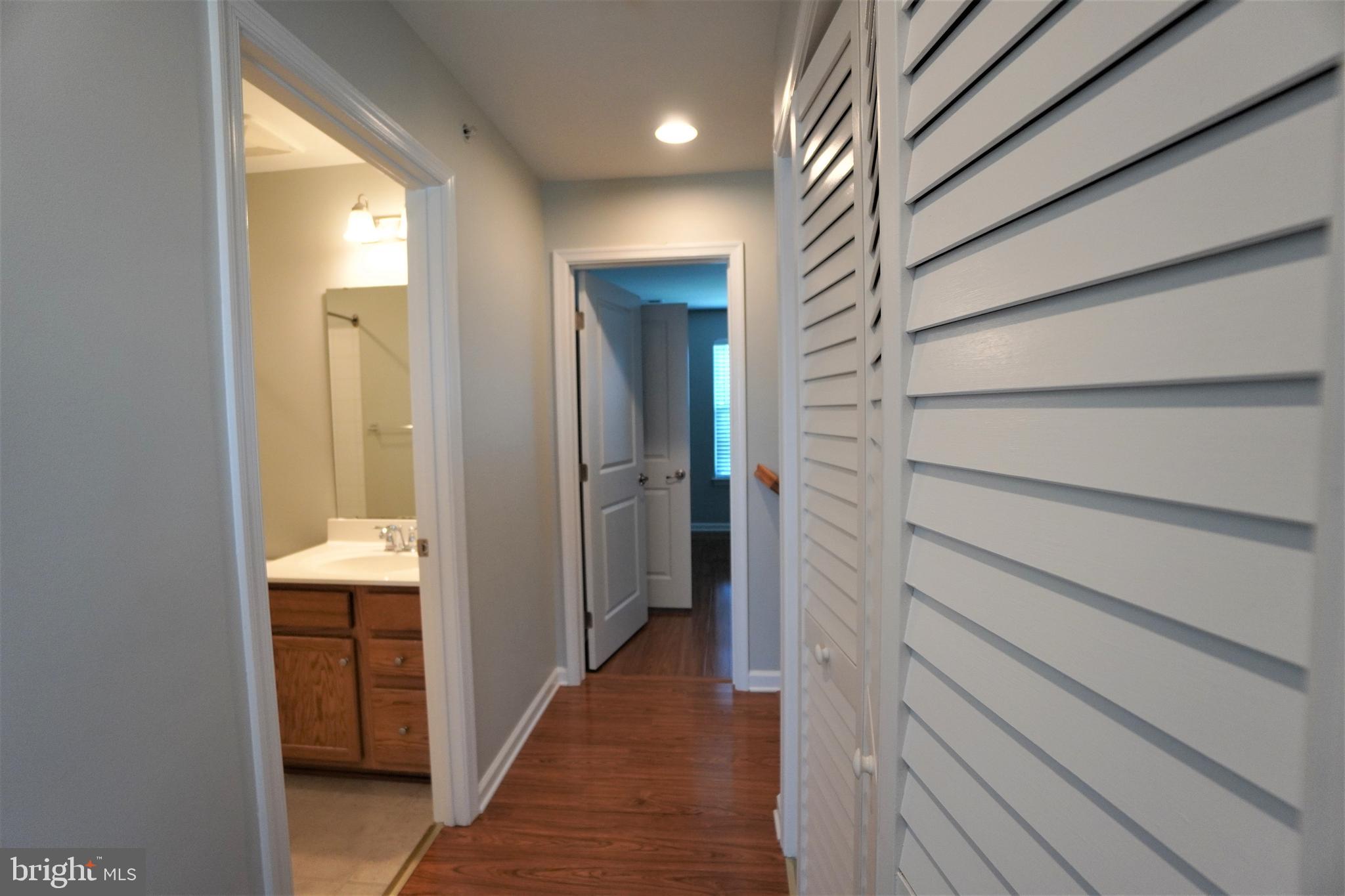 900 Susan Circle North Wales, PA 19454 - Photo 22 of 30 a view of a hallway with wooden shelves