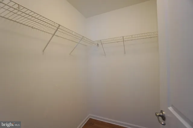 a view of a room with racks on the wall