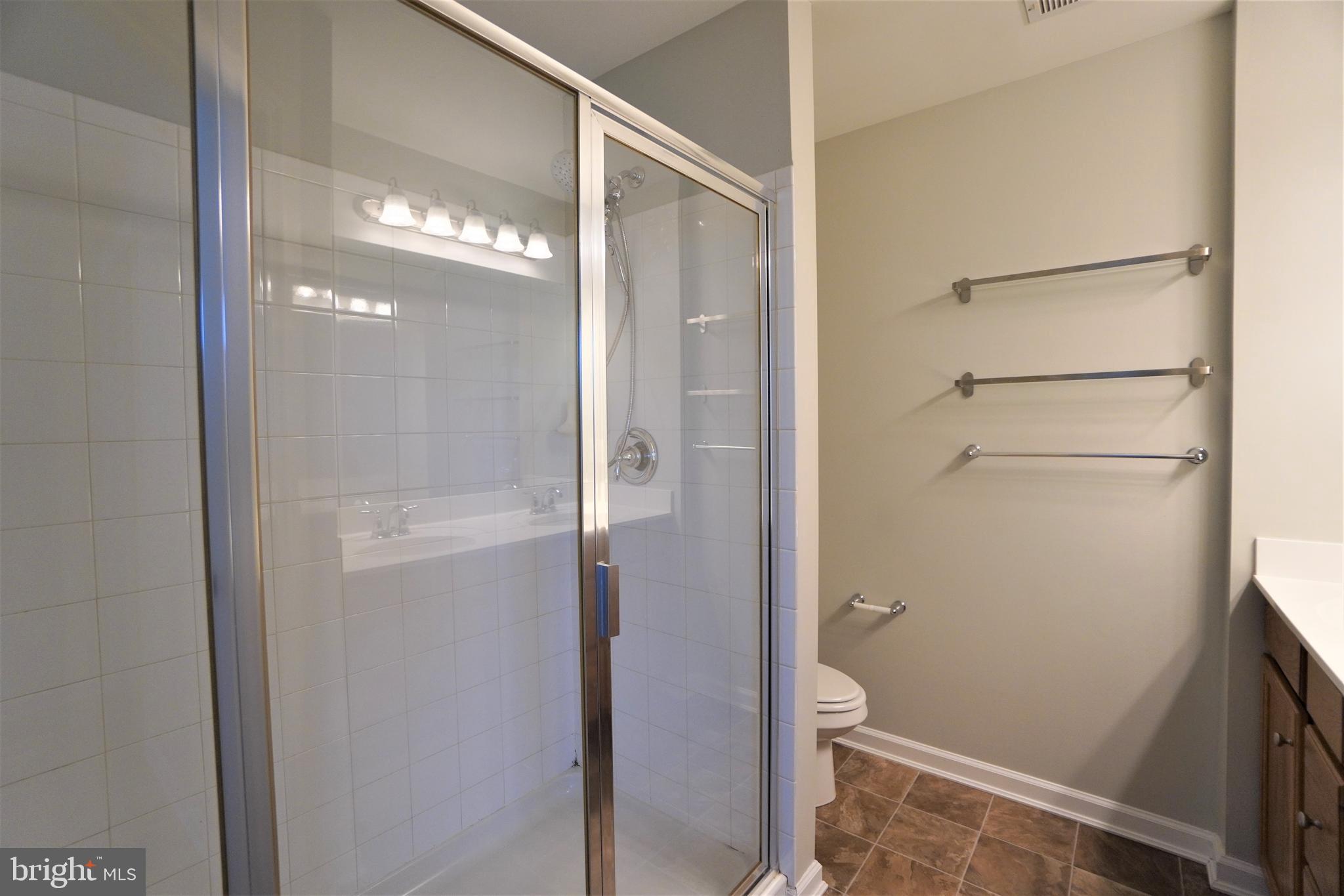 900 Susan Circle North Wales, PA 19454 - Photo 26 of 30 a bathroom with a glass shower door