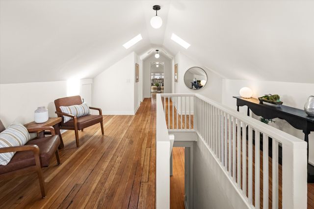 a view of entryway with wooden floor