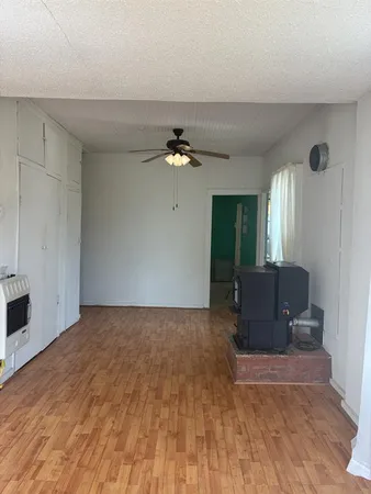 a view of livingroom with furniture and wooden floor