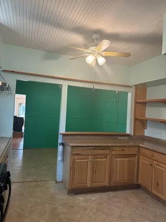 a kitchen with a sink and dishwasher