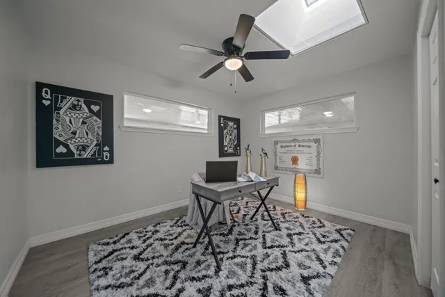 a workspace with wooden floor