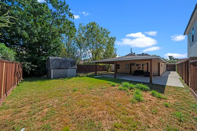 a house view with a garden space
