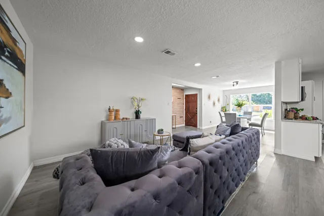 a living room with furniture and a couch